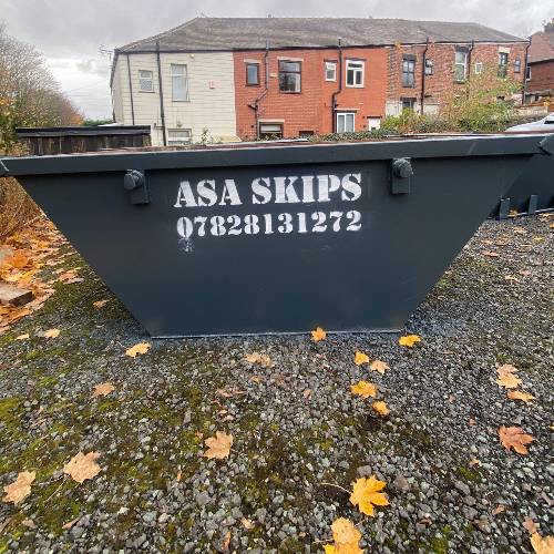 Well-maintained ASA Skips with clear branding - professional waste management Tameside